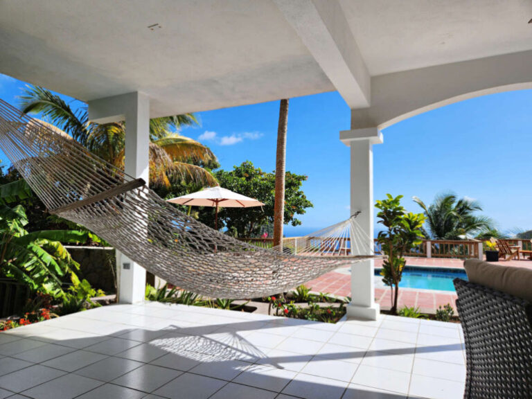 Harmony House Hammock umbrella use 770x578 1 1 768x576